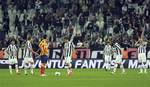 Juventus' players react after Lecce' Andrea Bertolacci scored during a Serie A soccer match between Juventus and Lecce at the Juventus Stadium in Turin, Italy, Wednesday, May 2, 2012. An unlikely error from goalkeeper Gianluigi Buffon handed 10-man Lecce a late equalizer and Juventus was held to a 1-1 draw Wednesday that cut its lead over AC Milan to just one point with two rounds remaining in Serie A.