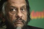 U.N.’s Intergovernmental Panel on Climate Change (IPCC) head Rajendra Pachauri looks on at a press conference in New Delhi, India, Thursday, Jan. 21, 2010. Five glaring errors were discovered in one paragraph of the world's most authoritative report on global warming, forcing the Nobel Prize-winning panel of climate scientists at the IPCC who wrote it to apologize and promise to be more careful.