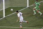 In this Wednesday, June 23, 2010 file photo, United States' Clint Dempsey, bottom, misses a chance to score as Algeria's Nadir Belhadj runs beside, right, during the World Cup group C soccer match between the United States and Algeria at the Loftus Versfeld Stadium in Pretoria, South Africa. After blown calls at vital moments of vital games, before a worldwide audience at the World Cup, the guardians of international soccer are being pressed harder than ever to explain resistance to video replay