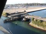 Glebe Island and the earlier (1903) Glebe Island Bridge, a swing bridge. Glebe Island was a major port facility in Sydney Harbour and, in association with the adjacent White Bay, New South Wales facility, was the primary receiving venue for imported cars and dry bulk goods in the region until 2008.