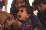 Afghan children returning home with their families are vaccinated against polio and measles at Kabul´s Pul-i-Charkhi distribution centre.