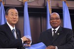 United Nations Secretary General Ban Ki-Moon, left, and South African President Jacob Zuma, right, shake hands as they met at the African Union Summit in Addis Ababa, Ethiopia, Monday, Jan. 30, 2012.