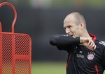 Bayern's Arjen Robben of the Netherlands gestures during the training session of FC Bayern Munich in Munich, Germany, Friday, May 18, 2012, the day before the soccer Champions League Final between Bayern Munich and FC Chelsea.