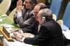 File - Mohammad Khazaee (right), Permanent Representative of Iran to the UN, confers with a colleague during the General Assembly’s meeting on a draft resolution introduced by Saudi Arabia regarding “Terrorist attacks on internationally protected persons”.