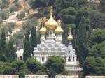 The Russian Orthodox Church of Maria Magdalene. The Arab neighborhood of at-Tur is located on the mountain's summit, and the Mount Scopus campuses of both the Hebrew University of Jerusalem, and the Brigham Young University Jerusalem Center abuts the mount on the north.