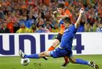 Dutch soccer player Klaas Jan Huntelaar, rear, and Igor Armas of Moldova battle for the ball during their Euro 2012 Group E qualifying soccer match between The Netherlands and Moldova at the Kuip stadium in Rotterdam, The Netherlands, Friday Oct. 7, 2011.