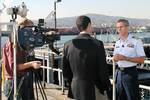 LOS ANGELES (Dec. 3, 2004) --Captain Peter Neffenger, the Sector LA/LB commanding officer, is interviewed by CNN reporter, Miguel Marquez, about Port Security in the Port of Los Angeles and the Port of Long Beach. USCG photo by PA3 Nathan Henise. (99066) ( CNN INTERVIEW (FOR RELEASE) )