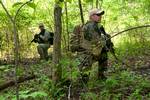 110512-A-PX072-36 Army soldiers conduct a foot patrol while training at Camp Atterbury Joint Maneuver Training Center, Ind., on May 12, 2011. The soldiers, assigned to the 2nd Battalion, 19th Special Forces Group, participated in a weeklong training exercise. DoD photo by Staff Sgt. David Bruce, U.S. Army. (Released)