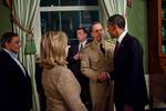 President Barack Obama shakes hands with Admiral Mike Mullen, Chairman of the Joint Chiefs of Staff, in the Green Room of the White House following his statement detailing the mission against Osama bin Laden, May 1, 2011. CIA Director Leon Panetta and Secretary of State Hillary Rodham Clinton are pictured at left.