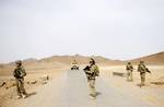 U.S. Army National soldiers from Provincial Reconstruction Team Farah pull security during a road assessment mission in Farah province, Afghanistan, May 9. SECFOR is made up of National Guard infantrymen out of Alaska who are responsible for ensuring the safety of everyone assigned to FOB Farah. PRT Farah is a unit of soldiers, sailors and airmen working with various government and non-government agencies tasked with facilitating governance and stability in the region by working hand in hand wit