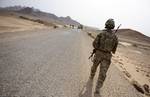 U.S. Army National Guard Staff Sgt. Joshua White, a security force member of Provincial Reconstruction Team Farah, pulls security during a road assessment mission in Farah province, Afghanistan, May 9. SECFOR is made up of National Guard infantrymen out of Alaska who are responsible for ensuring the safety of everyone assigned to FOB Farah. PRT Farah is a unit of soldiers, sailors and airmen working with various government and non-government agencies tasked with facilitating governance and stabi