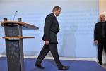 Former German Defense Minister, German Labour Minister Franz Josef Jung, leaves the podium after a news conference in Berlin, Germany, Friday, Nov. 27, 2009. Germany's labor minister says he is resigning from the Cabinet amid the fallout from an airstrike in northern Afghanistan that already cost the head of the armed forces his job. Franz Josef Jung was defense minister at the time of the Sept. 4 airstrike, which is believed to have killed civilians, but acknowledged this week that he had not s