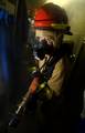 Machinist's Mate Fireman Michael Moody stands by as a reflash watch after battling a simulated berthing fire aboard USS Harry S. Truman (CVN 75).