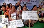 Kolkata: Gorkha Janamukti Morcha women activists staging a dharna in Kolkata on Saturday demanding CBI inquiry into 8th February Police firing in Jalpaiguri in Eastern India City