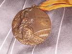 The bronze medal from the 1980 Summer Olympics showing Cassioli's obverse design. In 1923 the International Olympic Committee (IOC) launched a competition for sculptors to design the medals for the Summer Olympic Games.