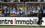 Inter Milan coach Jose Mourinho, right, looks on during their friendly soccer match against Monaco, in Monaco stadium, Thursday, July 30, 2009.