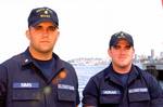 SEATTLE, Wash. (July 3) --- Portraits of Petty Officer Third Class Thomas W. Sims and Petty Officer Third Class Michael T. Horan of the Coast Guard's first Marine Safety and Security Team in Seattle. MSSTs are domestic mobile units that possess specialized training capabilities to perform a wide spectrum of port safety and security operations. They are modeled after the Coast Guard's Port Security Units (PSUs) and Law Enforcement Detachments (LEDETs). MSSTs are being establised to protect milita