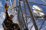 U.S. Air Force Tech. Sgt. Mark Quinn, 142nd Fighter Wing (FW), Oregon Air National Guard (ORANG), Ore., performs an inspection survey on a communications tower near Tucson, Arizona on January 18, 2007.