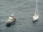 SEATTLE - A 47-foot motor lifeboat crew from Station Coos Bay, Ore., takes the sailing vessel Nakahara Maru in tow after it suffered a steering malfunction 11 miles northwest of Cape Blanco, Ore., Dec. 18, 2011. The motor lifeboat crew towed the Nakahara Maru to Coos Bay with no injuries sustained. U.S. Coast Guard photo by Lt. Nathan Gruver. (1480207) ( vessel in tow )