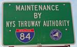 Thruway Authority maintenance sign at onramps, 1991-2010. In 1991, with New York facing a large budget deficit, Mario Cuomo's administration decided that the state DOT would essentially sell I-84 and the Cross Westchester Expressway (I-287), to the cash-rich New York State Thruway Authority (NYSTA) as one way of closing it.