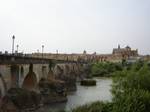 Cordoba (Spain) featuring Guadalquivir river & mosque , Roman bridge and Mezquita The mosque underwent numerous subsequent changes: Abd ar-Rahman III ordered a new minaret, while Al-Hakam II, in 961, enlarged the building and enriched the mihrab.