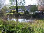 View of Ickenham village pond. A military station, operated by the Royal Air Force and later the United States Navy, was opened on part of Home Farm close to the parish boundary with Ruislip in 1917, later becoming known as RAF West Ruislip.