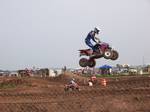 ATV racing on a motocross track.Sport models are built with performance, rather than utility, in mind. To be successful at fast trail riding, an ATV must have light weight, high power, good suspension and a low center of gravity.