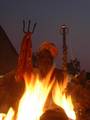 An Indian Sadhu - Hindu holy man - warms himself at a fire at a temporary camp in Kolkata, 09 January 2008. Thousands of Hindu pilgrims have started to converge for the Gangasagar Mela which will culminate on 14 January, on the occasion of Makar Sankranti, a holy day of the Hindu calendar, during which a dip in the ocean at the confluence of the River Ganges and the Bay of Bengal, some 150 kms south of Kolkata, is considered to be of great religious significance in Eastern India