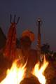 An Indian Sadhu - Hindu holy man - warms himself at a fire at a temporary camp in Kolkata, 09 January 2008. Thousands of Hindu pilgrims have started to converge for the Gangasagar Mela which will culminate on 14 January, on the occasion of Makar Sankranti, a holy day of the Hindu calendar, during which a dip in the ocean at the confluence of the River Ganges and the Bay of Bengal, some 150 kms south of Kolkata, is considered to be of great religious significance in Eastern