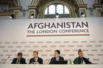 Gordon Brown, UK Prime Minister, Ban Ki-moon, UN Secretary General, David Miliband, Secretary of State for Foreign and Commonwealth Affairs and Hamid Karzai, President of the Islamic Republic of Afghanistan, in the Plenary room at Lancaster House during Afghanistan, The London Conference in London, UK today January 28, 2010. The one-day London conference on Afghanistan, organized by the United Kingdom, France and Germany, is highlighting European civilian and foreign aid contributions to Afghani