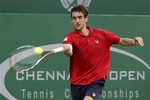 Croatia's Marin Cilic returns the ball to India's Somdev Devvarman during their final match in ATP Chennai Open Tennis tournament in Chennai, India, Sunday, Jan. 11, 2009. Third-seeded Cilic defeated Devvarman 6-4, 7-6 (3) Sunday to clinch his second ATP Tour title