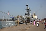 Indian Civilian visitors are visiting the war ship INS Airavat, INS Karmuk, INS Kuthar  in Kolkata on Tuesday, 08 November 2011. The Indian Navy allowed members of the public to board three of their warships anchored in Kolkata as part of forthcoming Naval Day celebrations in Eastern India City