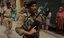 Indian paramilitary troops keep vigil After in Srinagar on June 15,2012. Suspected Muslim rebels gunned down Ganaie in the latest string of alleged political killings in Kashmir. Ganaie was shot at close range by suspected rebels as he was leaving his home to offer Friday prayers at a local mosque,police said.