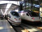 High speed trains AVE Class 103 and Avant Class 104 in Málaga's Maria Zambrano station.