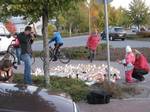 People and candles in front of Kauhajoen koti- ja laitostalousoppilaitos school (in Kauhajoki, Finland) one day after shooting incident.