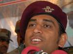 Mahendra Singh Dhoni, Indian cricket team captain and honourary Lieutenant Colonel in the Indian Territorial Army, looks on during a press conference at the Army headquarters in Baramulla, north of Srinagar, on June 3,2012. The cricket boards of India and Pakistan are the ones to decide on the timing and venue for any bilateral cricketing engagements between the two countries, Dhoni said. Dhoni visited the frontier district of Baramulla along the Line of Control in and interacted with soldiers a