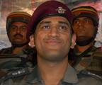 Mahendra Singh Dhoni, Indian cricket team captain and honourary Lieutenant Colonel in the Indian Territorial Army, looks on during a press conference at the Army headquarters in Baramulla, north of Srinagar, on June 3,2012. The cricket boards of India and Pakistan are the ones to decide on the timing and venue for any bilateral cricketing engagements between the two countries, Dhoni said. Dhoni visited the frontier district of Baramulla along the Line of Control in and interacted with soldiers a