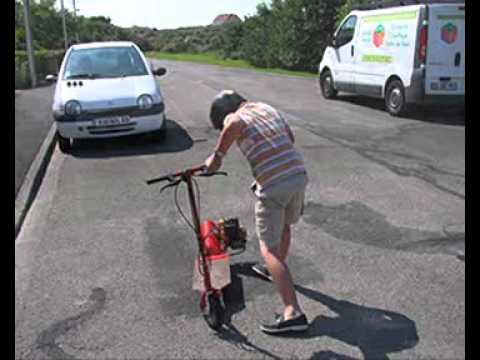 trottinette avec un moteur de débroussailleuse 26 CC.wmv