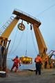 ARCTIC OCEAN - A bottom-moored autonomous acoustic recorder, known as a High-frequency Acoustic Recording Package (HARP), is rigged to be deployed from the Coast Guard Cutter Healy in the Arctic Ocean Sept. 14, 2009. The 1,100-pound HARP will spend nearly a year on the ocean floor at a depth of almost 1,000 feet measuring ambient noise at its location. While deployed, a hydrophone will record sounds made by whales, seals and other marine mammals. It also monitors sounds created by movements of i