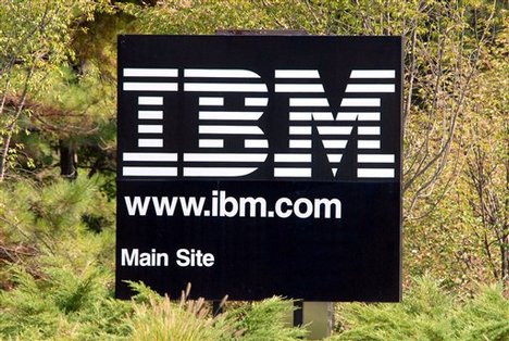 ** FILE ** The IBM logo at the main campus in Research Triangle Park, N.C. is seen in this July 31, 2007 file photo. Computer server and software maker IBM Corp. on Monday, Jan. 14, 2008 reported preliminary fourth-quarter earnings from continuing operations rose 24 percent year-over-year to beat Wall Street expectations by a wide margin, with the weaker dollar helping to push revenue up 10 percent. (AP Photo/Karen Tam, file)hg3