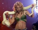 Britney Spears performs with snake during the finale of the 2001 MTV Video Music Awards Thursday, Sept. 6, 2001, at New York's Metropolitan Opera House.