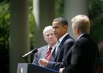 President Barack Obama, accompanied by BP Oil Spill Commission co-chairs, former Florida Sen. Bob Graham, and former EPA Administrator William Reilly, speaks in the Rose Garden of the White House in Washington, Tuesday, June 1, 2010.