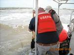 NEAR CAMERON, LA - Environmental Protection Agency (EPA)On-Scene Coordinator (OSC) Adam Adams performs sediment sampling off the coast of Louisiana in an effort to have background data on water and sediments. EPA OSCs are located in SE Louisiana heading up EPAs environmental sampling and monitoring efforts. US EPA Photo. (965802) ( EPA Sediment Sampling )