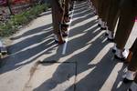 India Policemen raise their rifles during Minister State of home Nassir Aslam Wani along with Director General of Police, Kuldeep Khoda and other senior police official inspect in guard of honor during a function held in connection with the removing the concertina wire from the bunker before its removal in Srinagar, the summer capital of Indian Kashmir. 20, April, 2012.