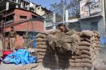 Indian paramilitary troopers removing the concertina wire from the bunker before its removal in Srinagar, the summer capital of Indian Kashmir. 20, April, 2012.