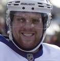 Phil Kessel smiles for the crowd at the Toronto Maple Leafs practice at the outdoor rink at Trinity Bellwoods park in Toronto. The Leafs occasionally hold practices at outdoor public rinks in Toronto, in order to help secure private sponsorship for rink refurbishment projects, 22 December 2010,