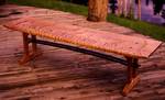 A bench made of highly figured maple wood. Some of the larger maple species have valuable timber, particularly Sugar maple in North America, and Sycamore maple in Europe. Sugar maple wood — often known as 