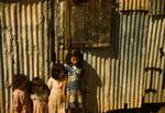 Children in a company housing settlement, San Juan, 1941. On July 25, 1898, during the Spanish-American War, Puerto Rico was invaded by the United States with a landing at Guánica.