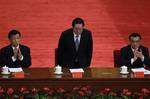 Chinese Vice Premier LI Keqiang, right, and LIu Yunshan, left, Director of Chinese Communist Party's Propaganda Department, clap while Zhou Yongkang, center, member of Chinese Communist Party Politburo Standing Commitee, is introduced during a conference to celebrate the 90th anniversary of the founding of Chinese Communist Youth League at the Great Hall of the People in Beijing, China, Friday, May 4, 2012.