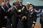 110930-F-RG147-1242President Barack Obama congratulates the new Chairman of the Joint Chiefs of Staff Gen. Martin E. Dempsey, U.S. Army, during the Chairman of the Joint Chiefs of Staff change of responsibility ceremony at Summerall Field, Joint Base Myer-Henderson Hall, Va., on Sept. 30, 2011. Dempsey succeeded Adm. Mike Mullen, U.S. Navy, as the 18th chairman of the Joint Chiefs. DoD photo by Tech. Sgt. Jacob N. Bailey, U.S. Air Force. (Released)